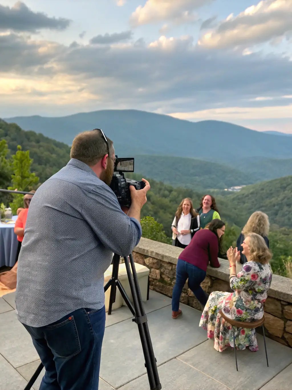 A professional videographer capturing candid moments during a retreat event, highlighting the importance of preserving memories.